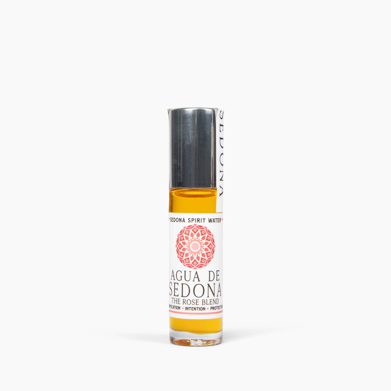 Agua de Sedona Rose Blend roll-on bottle with silver cap on white background.
